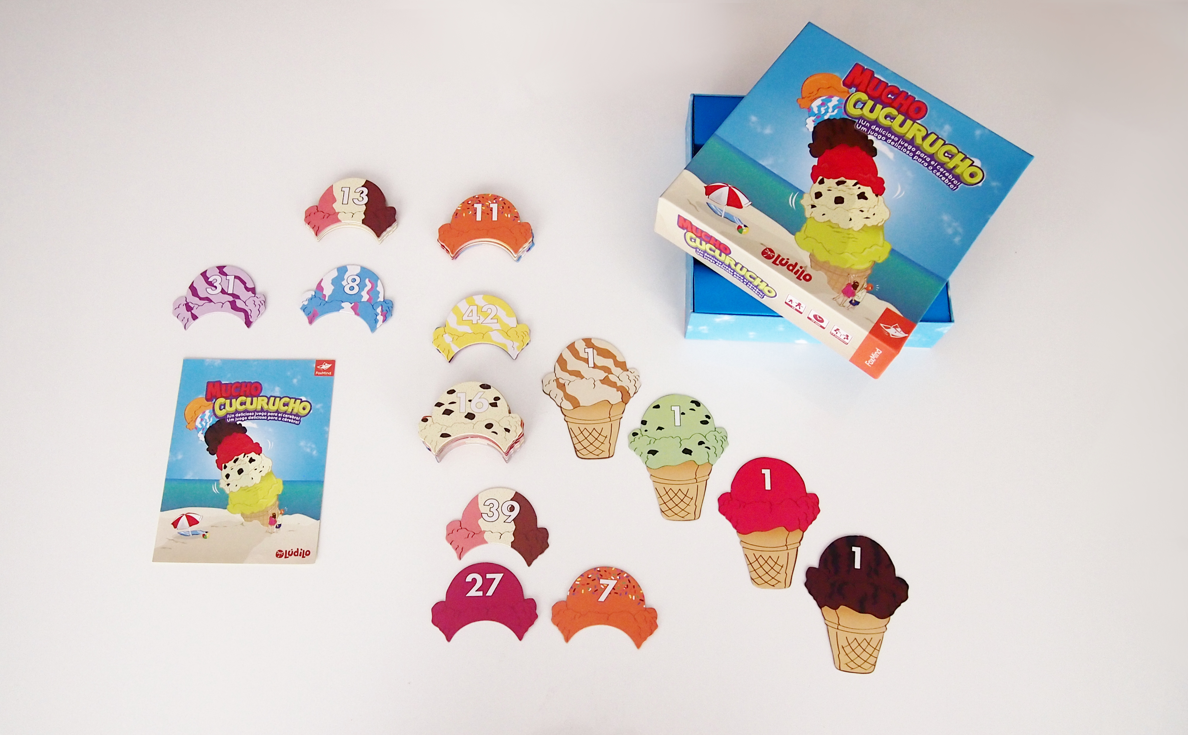 Componentes de juego: 4 conos y 48 bolas de helado. 